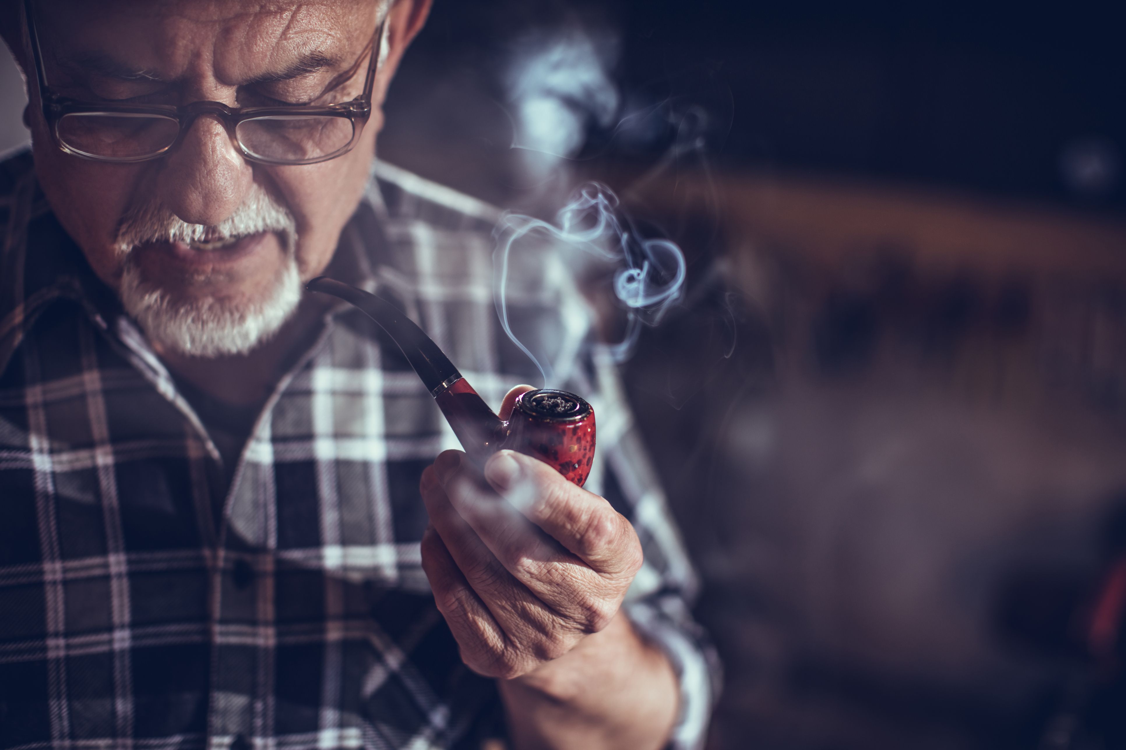 old-man-smoking-with-pipe-696654328-595674723df78c4eb62ad9ce